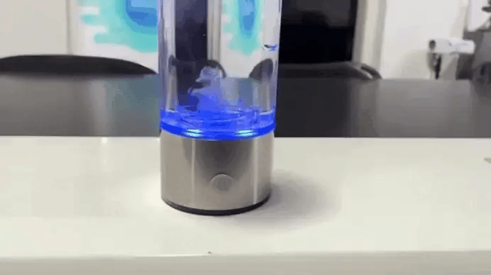 Portable Hydrogen Water Generator with glowing blue light and stainless lid, showing components