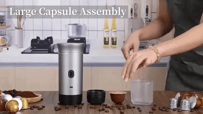 Person using coffee powder kit to fill capsule for portable espresso machine