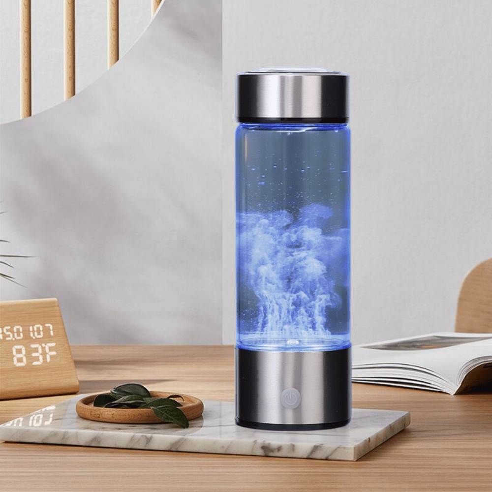 Hydrogen water generator in use on bedroom table, actively generating hydrogen for healthy hydration