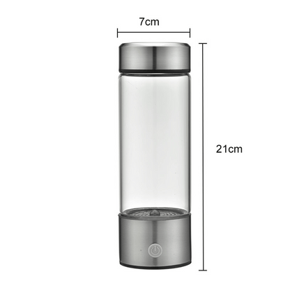 Hydrogen water generator bottle placed on icy surface, symbolizing freshness and pure hydrogen-enriched water