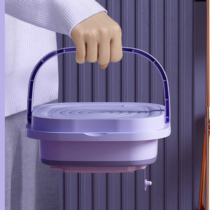 Hand lifting lightweight foldable washing machine with easy-carry handle design
